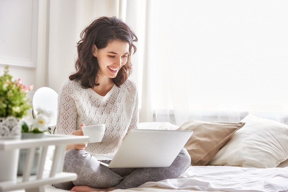 Businesswoman running a search from home